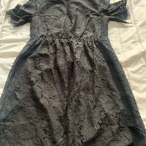 Lace maternity dress with elastic under bust.